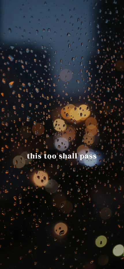 Calm iPhone lock screen wallpaper with the words “this too shall pass” over a rain photo
